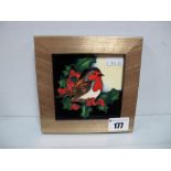 A Moorcroft Pottery Plaque, decorated with the RSPB ' Nations Favourite' (Robin) design by Kerry