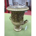 A XIX Century Brass Twin Handled Urn, cast decoration of a frieze of classical figures dancing and