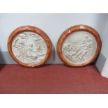 Pair of Circular Plaster Wall Plaques, featuring classical maiden scene, approximately 63cms