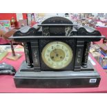 A Late XIX Century Black Slate 8 Day Mantel Clock, of architectural form, marble columns, ivorine