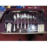 A Canteen of Community Plate Cutlery, together with three hallmarked silver teaspoons.