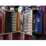 A XX Century Mahogany Cased Canteen of Cutlery, with moulded edge, two fitted drawers and hinged lid