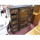 Oak Breakfront Book Cabinet, with fall fronted bureau over panelled cupboard door, flanked by lead