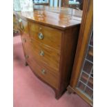 A XIX Century Mahogany Bow Fronted Chest of Drawers, with two short and two long drawers, shaped