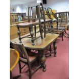 1930's Oak Draw Leaf Dining Table, on bulbous and block supports united by "X" stretcher; together
