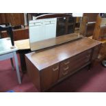 An E.Gomme for G Plan 1970's Sideboard, with three drawers flanked by cupboard doors.