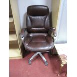 A Modern Brown Stitched Leather Open Arm Office Chair.