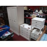 A Modern Four Piece Bedroom Suite, in off white, comprising double wardrobe, four heights chest