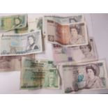 A Bank of England Peppiatt Lilac Ten Shillings Banknote, number L36D 874175. A further ten UK