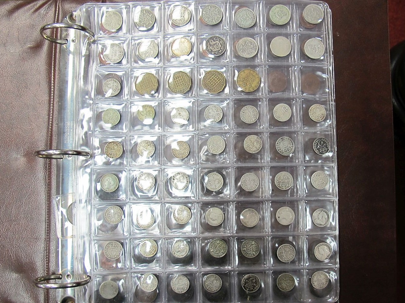 Forty-Four Silver Threepences and Twelve Pre-1947 Sixpences, as part of a collection of lower