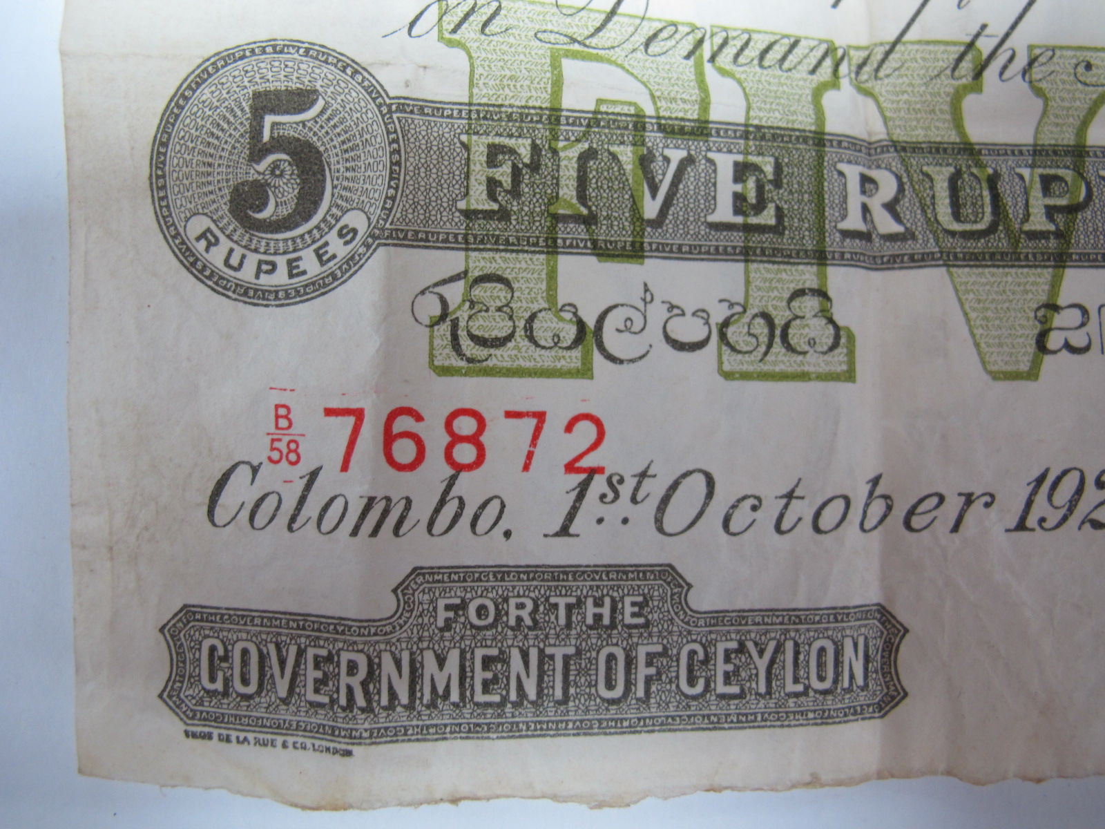 A Government of Ceylon Five Rupee Banknote, Colombo, 1st October 1925. Number B58 76872. Much folded - Image 3 of 7