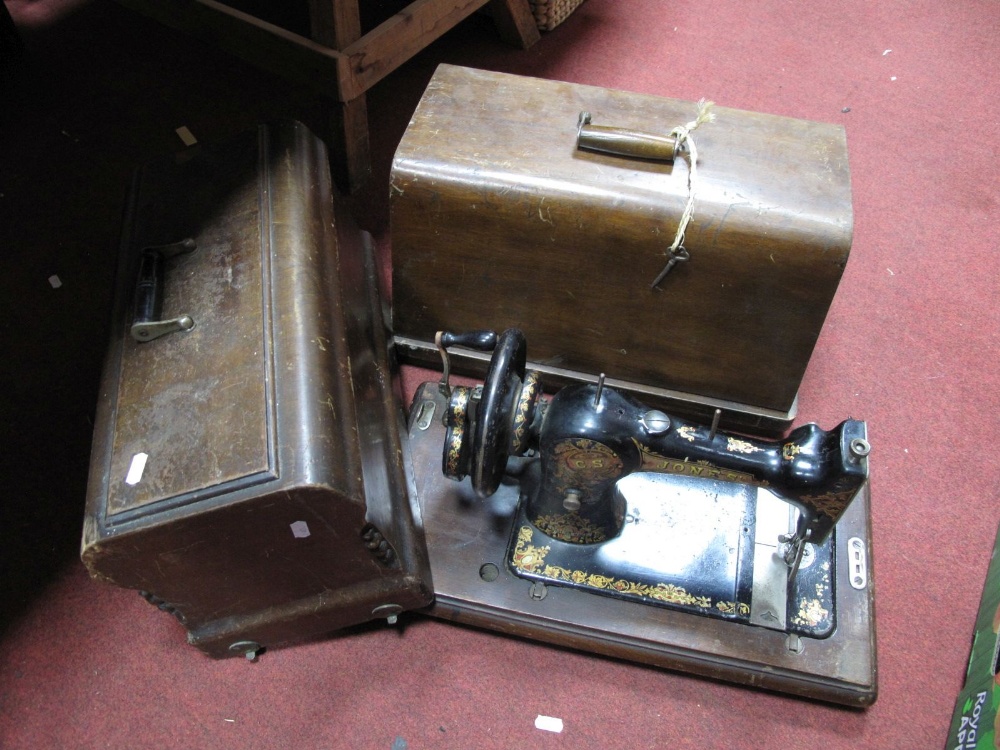 Two Early XX Century "Jones" Sewing Machines, (both cased).