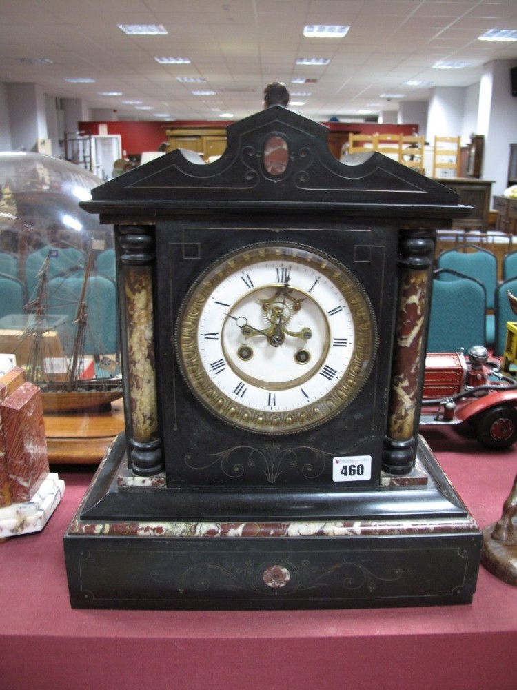 XIX Century Black Slate Mantel clock, with a white enamel dial, Roman numerals, plinth base.