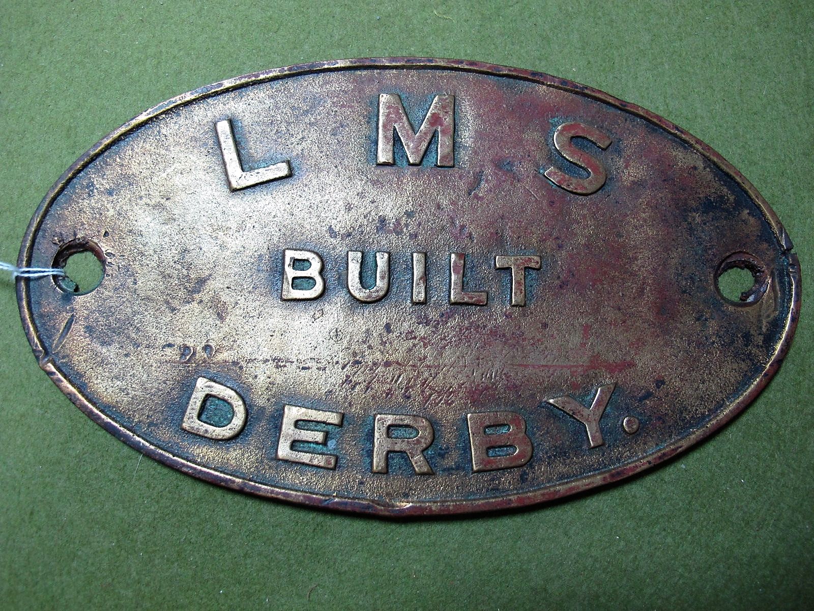 An LMS Cast Brass Worksplate- 'LMS Built Derby'.