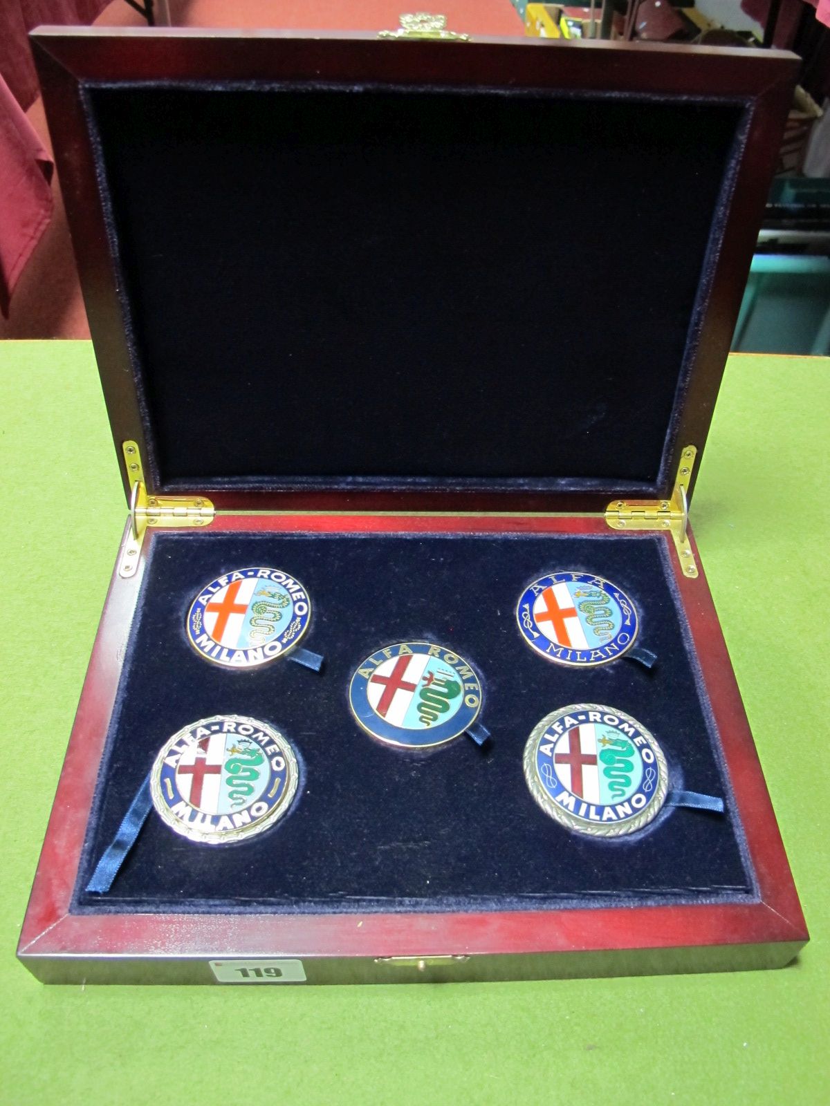 A Set of Five modern Alfa Romeo Grill Badges in Presentation Wooden Box (1910-1972).