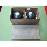 A Pair of E.J.Riley Ebonised Lawn Green Bowls, in original card box.