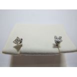 A Pair of Modern Princess Cut Single Stone Diamond Earstuds, each claw set on screw post, the