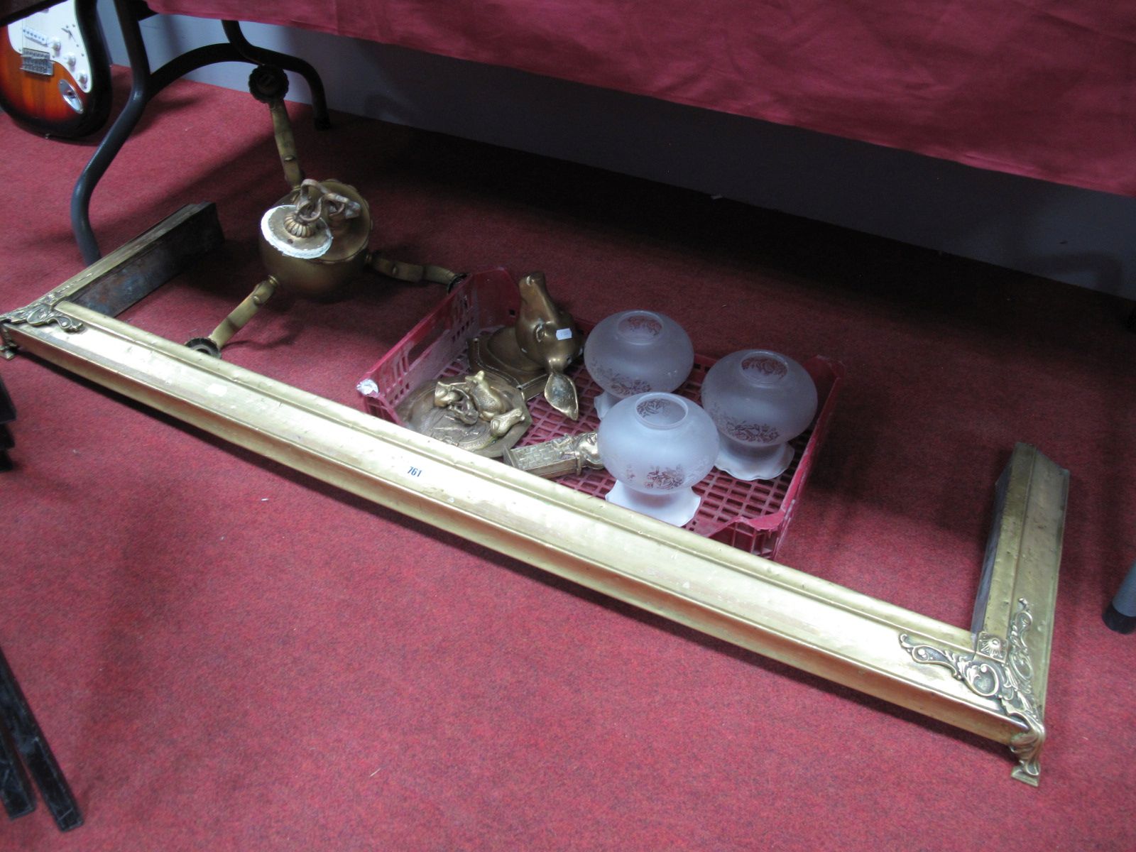 A Late Victorian Brass Fender, a heavy cast brass three branch chandelier (later shades), deer's