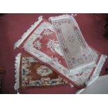Three Chinese Wool Tasseled Rugs, the largest 156 x 93cm.