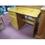 A Pine Desk, with a rectangular top, three single drawers.
