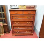 A Modern Mahogany Effect Five Heights Chest of Drawers, recessed drawer fascia , all on ogee feet.