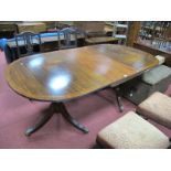 George III Style Mahogany Pedestal Table, with a crossbranded top, turned pedestal, swept and reeded