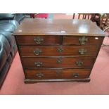 A George III Mahogany Veneerer Bachelors Chest, oak body with moulded edge, fitted with two short