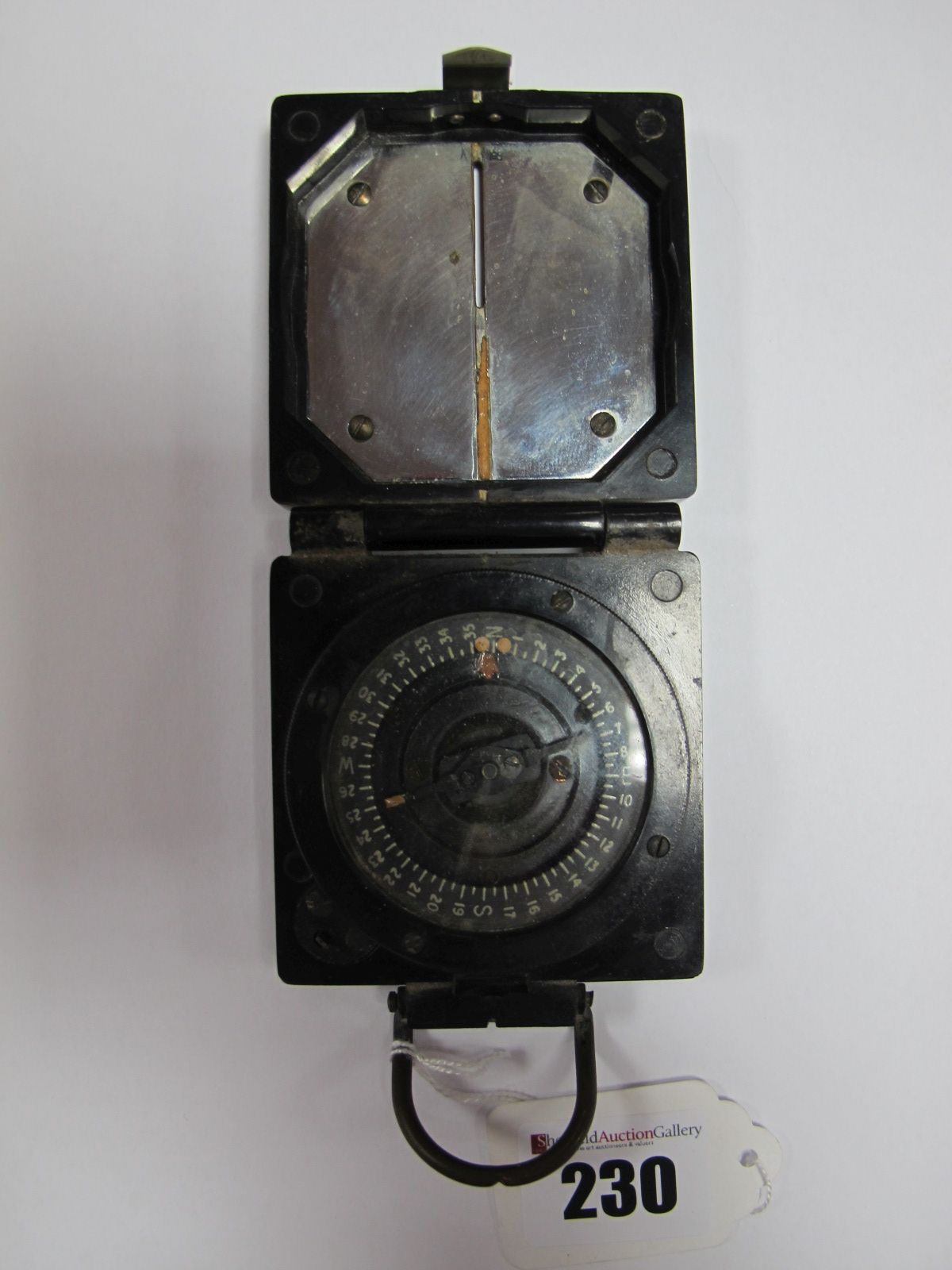 A Mid XX Century Mark I Compass, by T.G.Co with WD arrow.