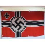 A Third Reich Flag (Nazi), measuring 8ft x 4 ft 6ins, marked REICHSKNEGSFL, complete with Halyard.