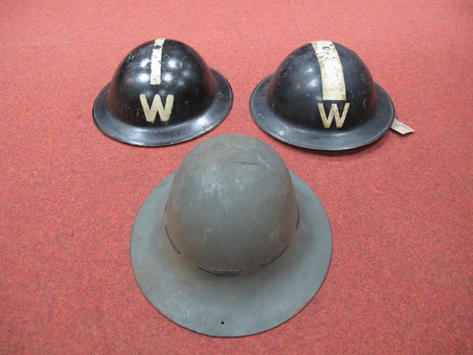 Three WWII Era Helmets, including one ARP Warden and another painted as Warden.