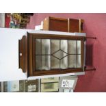 An Edwardian Inlaid Mahogany Display Cabinet, with a shaped low back, glazed astragal door, two