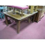 An Early XX Century Oak Rectangular Topped Dining Table, with cut corners on tapering legs.