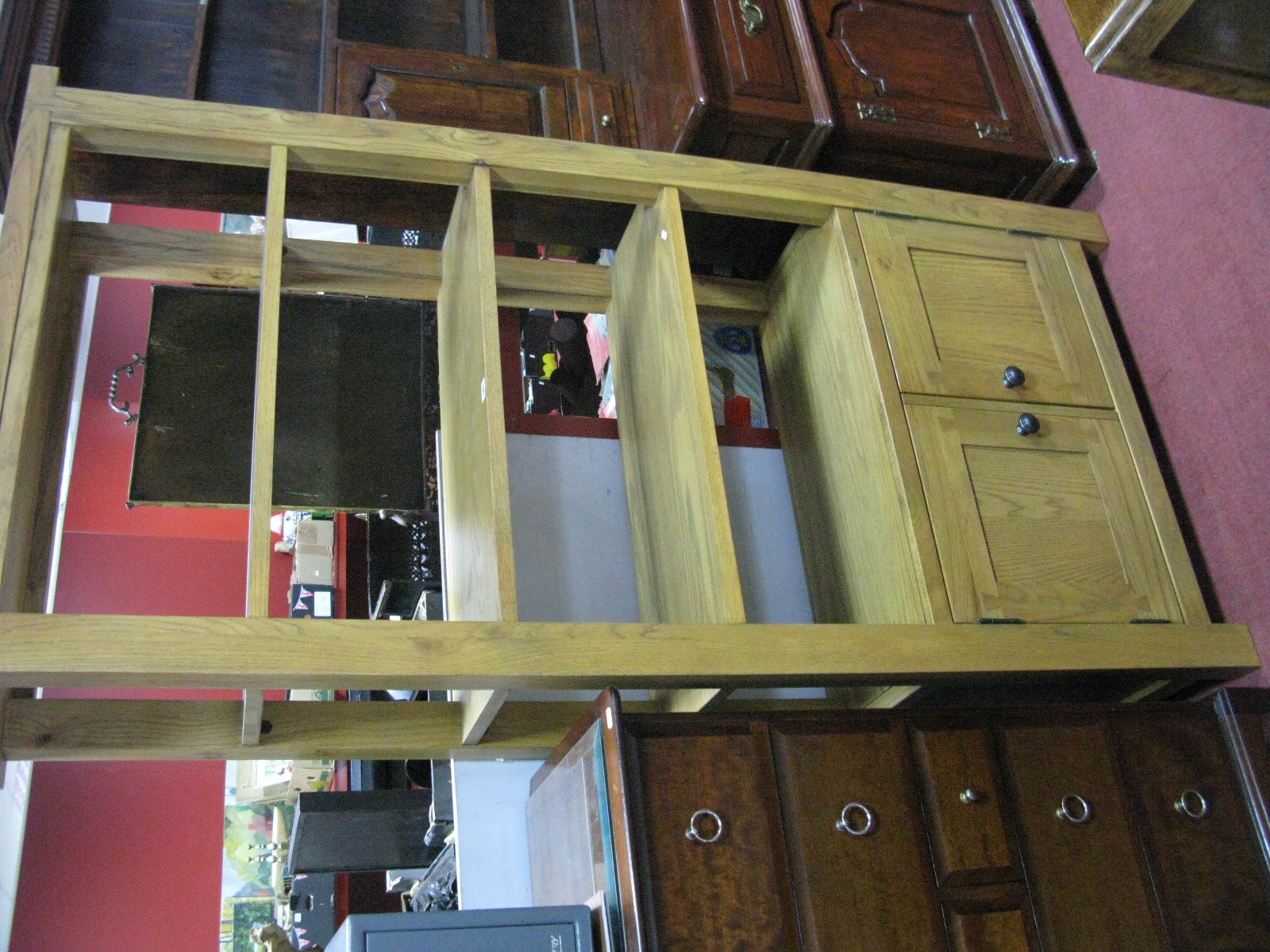 Oak Book Shelves, with open shelves, twin cupboard doors, on square supports.