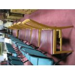 A Set of Eight Mid XX Century Oak Chapel Chairs, with rail backs with red leatherette seats,