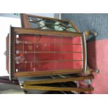 A 1920's Mahogany Slender Bow Front Display Cabinet, with shell motifs to low back and glazed