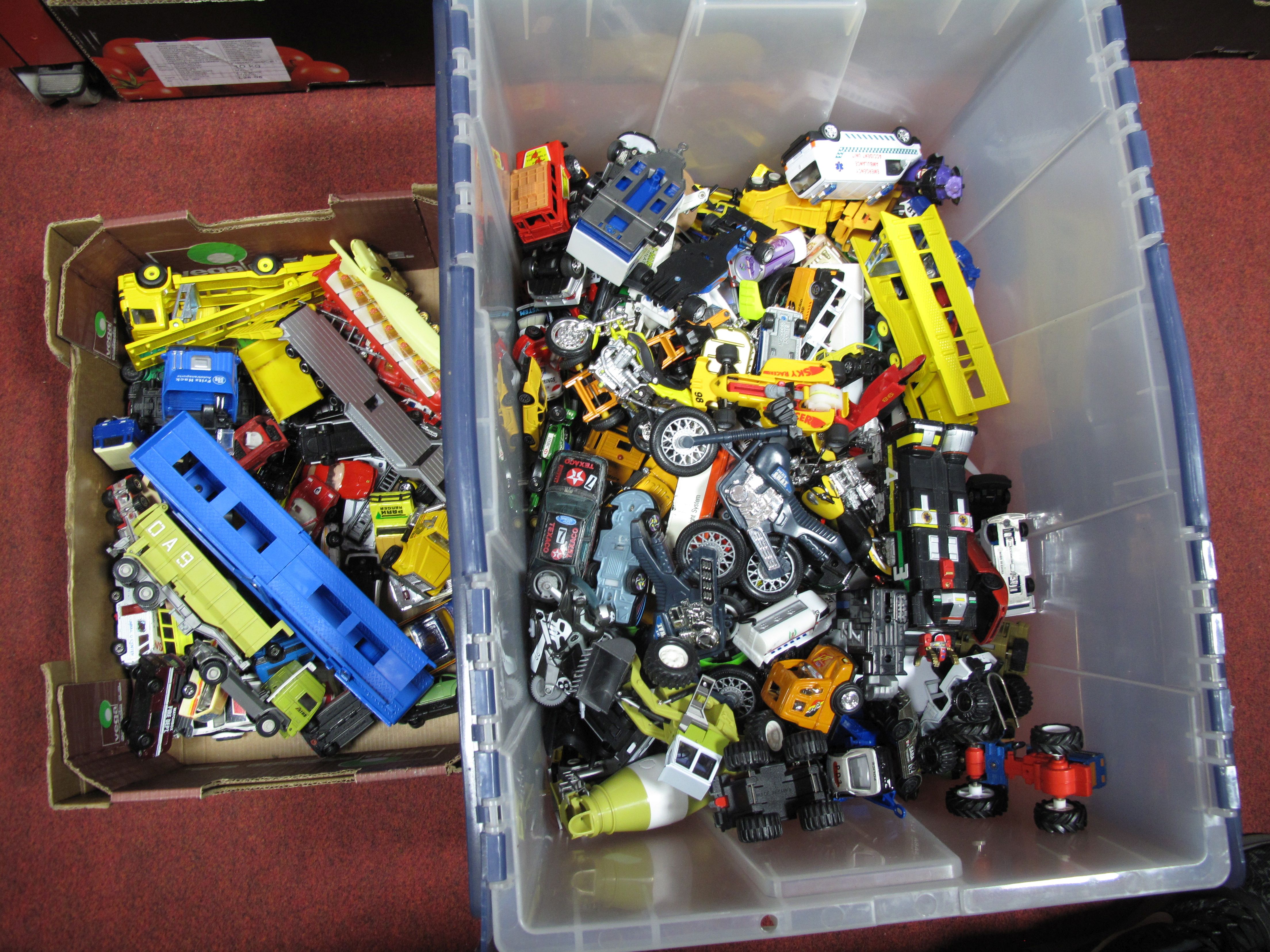 A Quantity of Playworn Diecast and Plastic Vehicles, including car transporters, emergency vehicles,