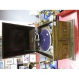 A 1930's Maxitone Oak Cased Table Top Gramophone, cushion hinged lid with internal decals, with