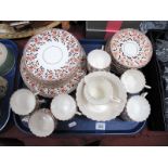 A Tea Service, with floral decoration and gilt highlights, comprising sandwich plate, cake plate,