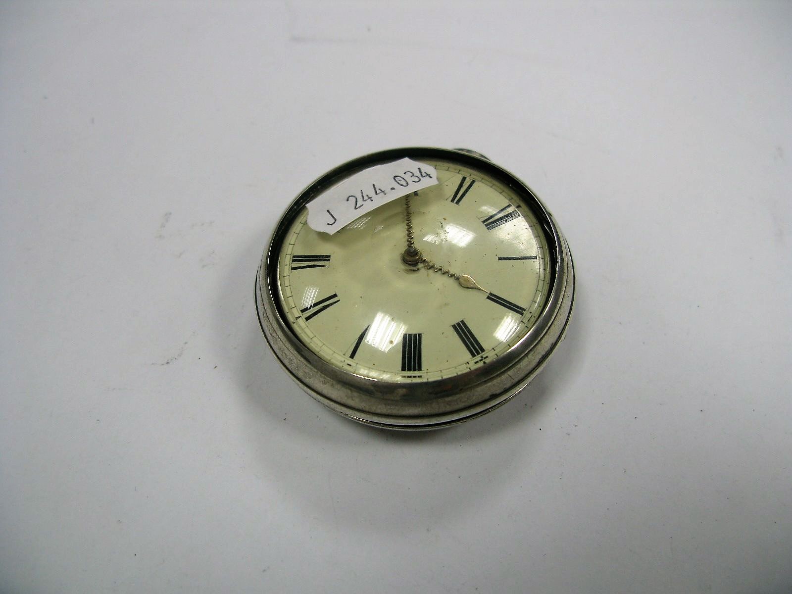 A Hallmarked Silver Pair Cased Pocketwatch, Birmingham 1889.