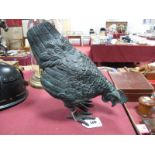 A Patinated Bronzed Model of a Hen, head down in pecking position, 25cm high.