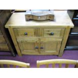 An Oak Cupboard, with dovetail top, two small drawers above two cupboards.