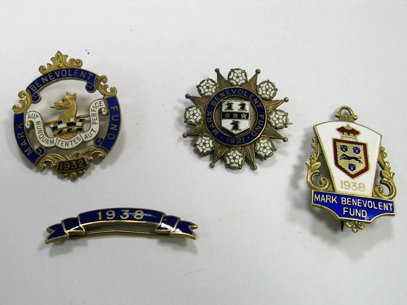 Four Silver Gilt and Enamelled (Masonic?) Medallions, dated from 1921 to 1938, (three marked "Mark