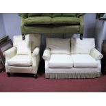 A Cream Two Seater Settee and Chair.