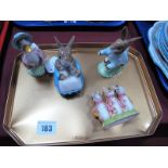 Four Royal Albert Beatrix Potter Figures, "Peter Rabbit", "Flopsy, Mopsy and Cottontail", "Jemima