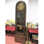 A 1920's Oak Longcase Clock, with dome top, Arabic numerals to circular brass dial, glazed door
