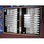 A Wooden Cased Set of Twelve Decorative Mother of Pearl Handled Fish Knives and Forks.