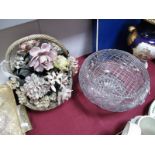 A Large Cut Glass Fruit Bowl, 25cm diameter, Capo Di Monte basket, 28cm high. (2)