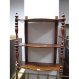 XIX Century Mahogany Serpentine Wall Shelves, united by spindle supports.