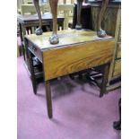 A Georgian Mahogany Pembroke Table, with single and dummy drawers on moulded legs, (one fretwork