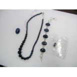 A Lapis Lazuli Bead Necklace, together with a bracelet, oval collet set, a modern brooch and